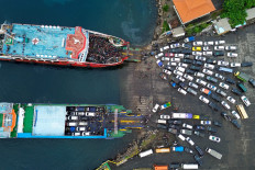 Homeward tide: An aerial view shows vehicles of homebound travelers lining up to board ferries at Gilimanuk Port in Jembrana, Bali, on March 15, 2026. Six days before Idul Fitri, traffic heading from Bali to Java surged as thousands of people began the annual mudik (exodus) to celebrate the holiday with family.