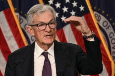US Federal Reserve Chair Jerome Powell speaks during a press conference following the Federal Open Market Committee meeting at the Federal Reserve Board Building in Washington, DC, on March 18, 2026. 