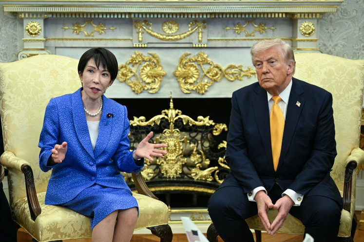 US President Donald Trump meets with Japan's Prime Minister Sanae Takaichi in the Oval Office of the White House in Washington on March 19, 2026.