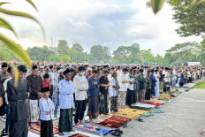 Thousands of Muslims perform Eid prayers on March 21, 2026, at the Lumintang Field in Denpasar, Bali.