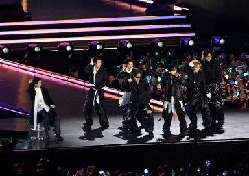 Kpop boy band BTS perform onstage during a comeback concert at Gwanghwamun Square on March 21, 2026 in Seoul, South Korea. 