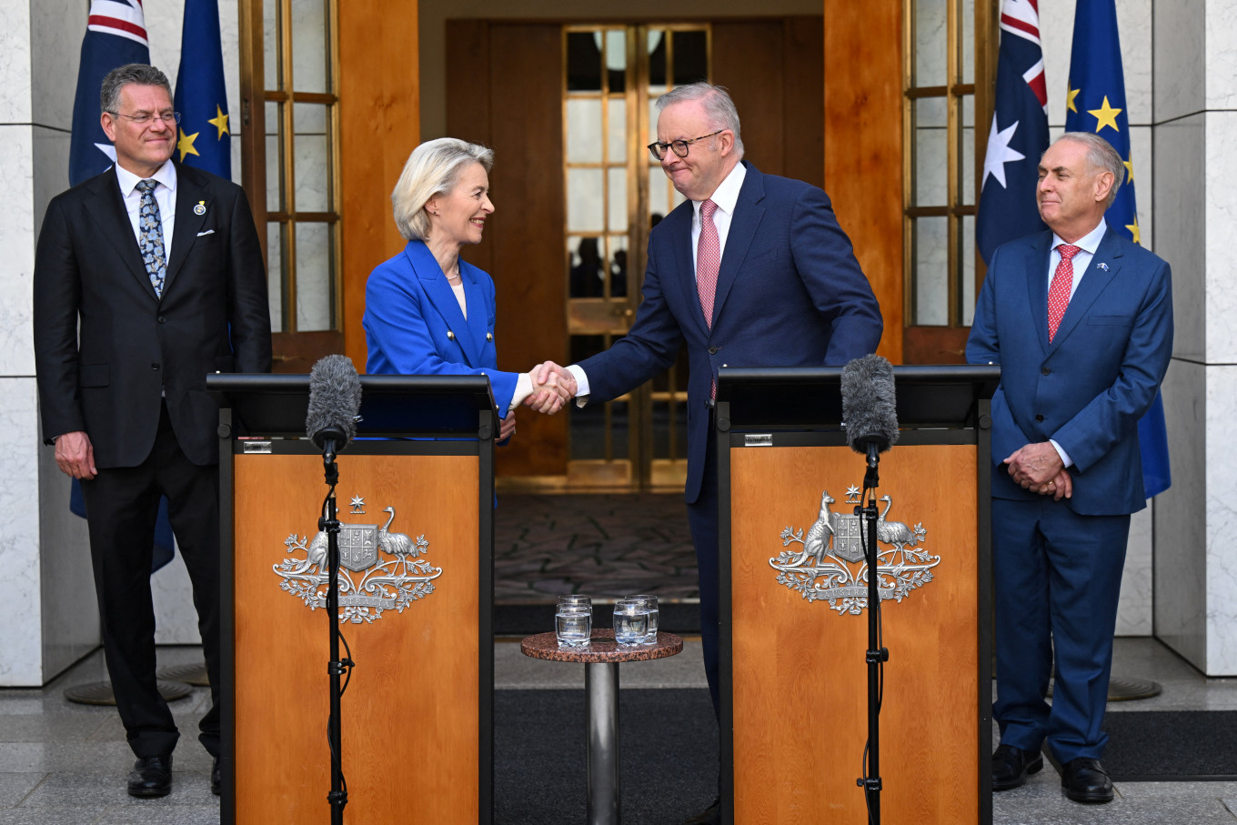 Australian Prime Minister Anthony Albanese and President of the European Commission Ursula von der Leyen shake hands during a press conference at Parliament House in Canberra, Australia, on March 24, 2026.