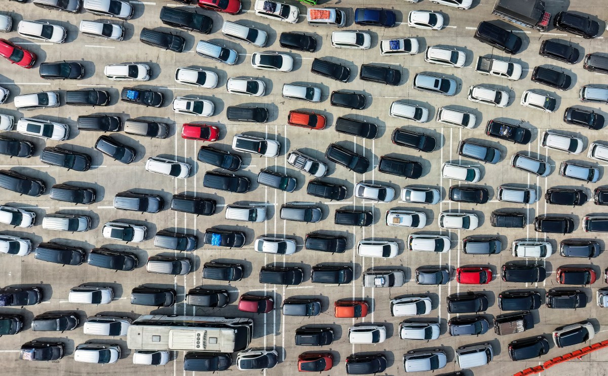 Vehicles stuck in a traffic jam on March 17, 2026, on the freeway, in this aerial photo, leave from Greater Jakarta at a toll booth in Cikampek, West Java. People were heading to their hometowns for the Idul Fitri holiday, which marks the end of the Muslim's holy fasting month of Ramadan. 