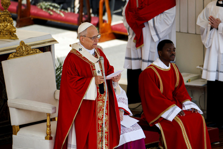 Pope Leo XIV delivers a homily during the Palm Sunday Mass in Saint Peter's Square at the Vatican, March 29, 2026.