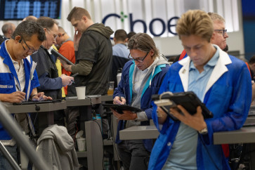 Traders work in the S&P options trading pit at the Cboe Global Markets exchange on March 31, 2026, in Chicago, Illinois, US.