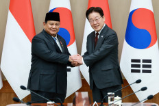 South Korean President Lee Jae Myung shakes hands with Indonesian President Prabowo Subianto during their meeting at the Presidential Blue House in Seoul, South Korea, April 1, 2026. 