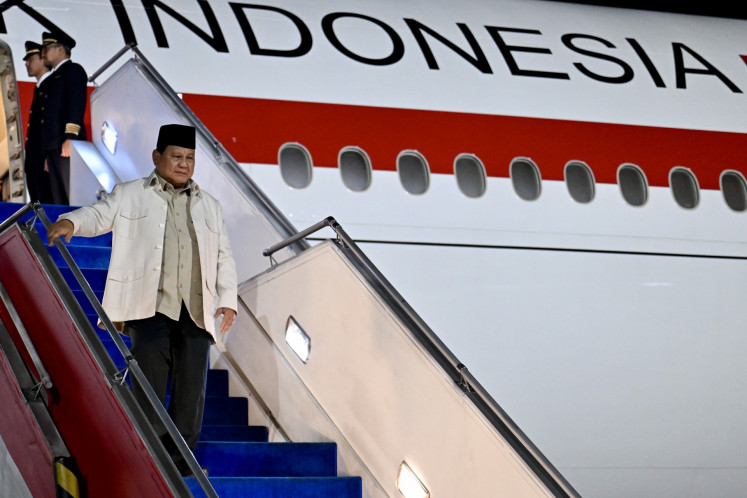 President Prabowo Subianto disembarks presidential aircraft Indonesia One at Halim Perdanakusuma Air Force Base in East Jakarta on April 1, 2026, after completing his four-day tour to Japan and South Korea.