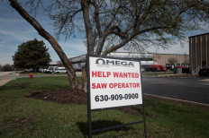 A sign posted in front of a business advertises job opportunities in Elk Grove Village, Illinois, US, on April 3, 2026. According to the Labor Department, the US economy added 178,000 jobs in March, far exceeding annalists expectations.