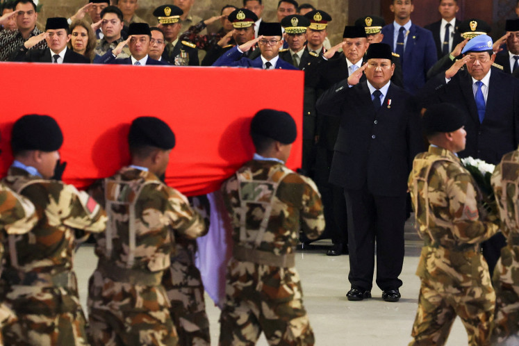 President Prabowo Subianto and former President Susilo Bambang Yudhoyono salute during a military honor ceremony for three United Nations Interim Force in Lebanon (UNIFIL) peacekeepers killed in Lebanon, at Soekarno-Hatta International Airport in Tangerang, Banten, April 4, 2026.