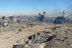 This handout photo provided by Iran's Revolutionary Guard Corps (IRGC) official website Sepah News on Sunday reportedly shows the wreckage and remains of a targeted and crashed aircraft in central Iran.