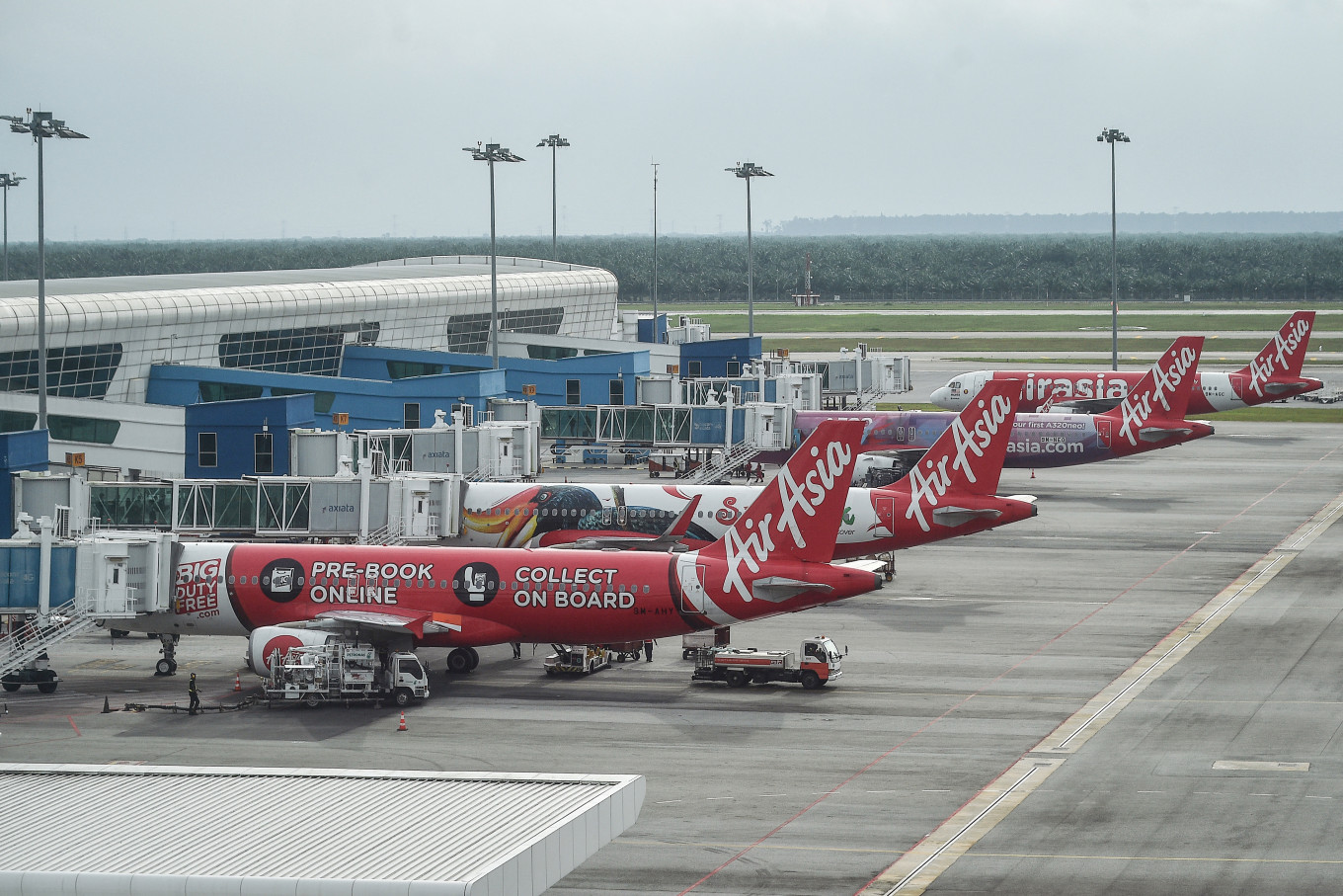 AirAsia airplanes are pictured on the tarmac at Kuala Lumpur International Airport in Sepang on Jan. 8, 2024.