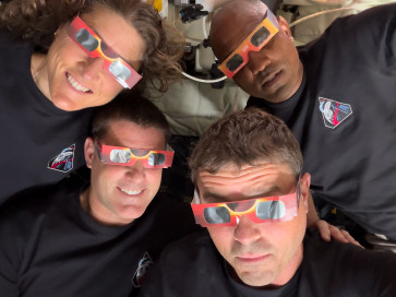 Eclipse magic: This handout picture released on Tuesday, April 6, 2026, by NASA shows Artemis II crew members mission specialist Christina Koch (top left), mission specialist Jeremy Hansen (bottom left), commander Reid Wiseman (bottom right) and pilot Victor Glover using eclipse viewers to protect their eyes at key moments during the solar eclipse they experienced during their lunar flyby, on Monday.