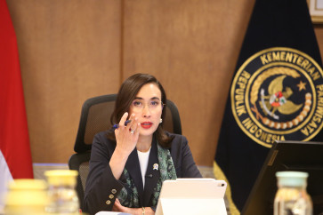 Tourism Minister Widiyanti Putri Wardhana gestures while speaking during a special interview with The Jakarta Post on April 9 at the Sapta Pesona Building in Jakarta.