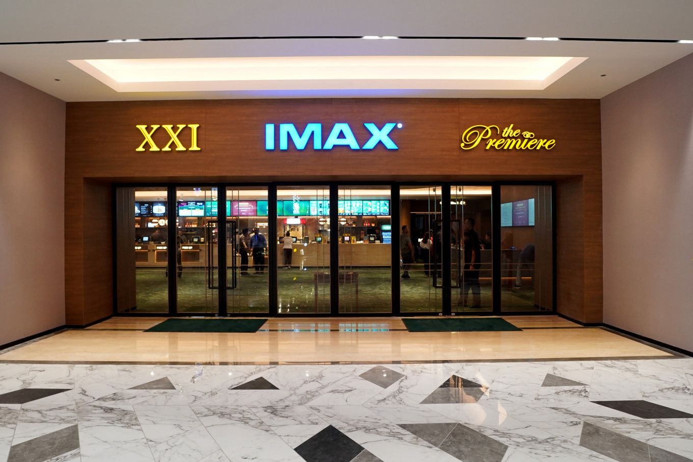 Front entrance of a Cinema XXI movie theater featuring IMAX and The Premiere screens in this undated picture.