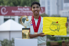 Thai golfer Pongsapak Laopakdee, known as &ldquo;Fifa,&rdquo; poses for a photograph following his win at the 2025 Asia-Pacific Amateur Championship in this undated file photo.