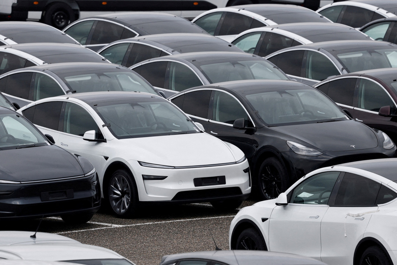 Tesla electric vehicles are pictured at one of the company's delivery centers in Valenton, near Paris, France, on April 24, 2025.