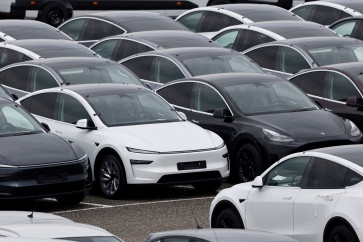 Tesla electric vehicles are pictured at one of the company's delivery centers in Valenton, near Paris, France, on April 24, 2025.