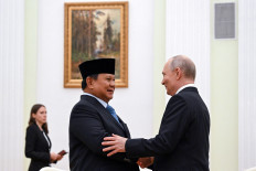 Russia&rsquo;s President Vladimir Putin greets Indonesia&rsquo;s President Prabowo Subianto during a meeting at the Kremlin in Moscow, Russia, April 13, 2026. 