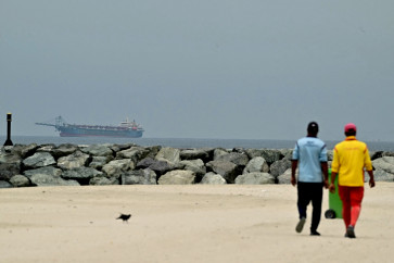 Troubled waters: A ship is seen in the Persian Gulf off the coast of Sharjah on Monday, April 13, 2026, the day after the failure of United States-Iran peace talks.