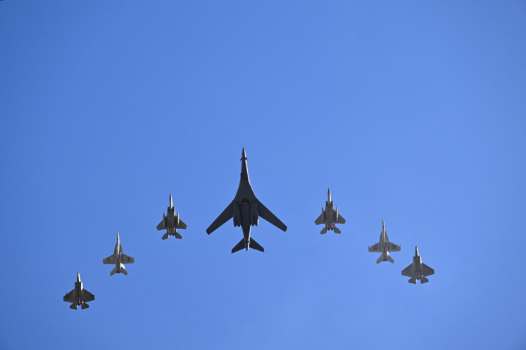 United States Air Force and Navy aircraft perform a flyover on Feb. 8 above Levi's Stadium ahead of Super Bowl LX between the New England Patriots and the Seattle Seahawks in Santa Clara, California, the US.