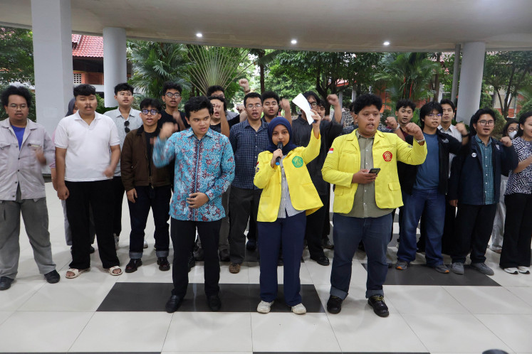 Students from the University of Indonesia's Student Executive Board Alliance express their grievances on April 14, 2026 regarding cases of sexual violence at the university's Faculty of Law in Depok, West Java.
