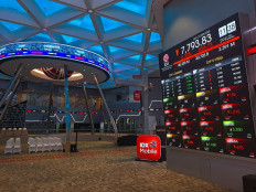 Red alert: An electronic display board inside the main hall of the Indonesia Stock Exchange (IDX) in South Jakarta shows an overall downward movement across most stocks during the lunch break on Jan. 29, 2026, when the IDX Composite index fell 6.3 percent after global investment firm MSCI raised concerns about free float and trading transparency. 