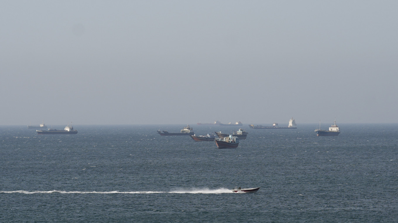 Ships and tankers in the Strait of Hormuz off the coast of Musandam, Oman, April 18, 2026. 