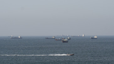 Ships and tankers in the Strait of Hormuz off the coast of Musandam, Oman, April 18, 2026. 