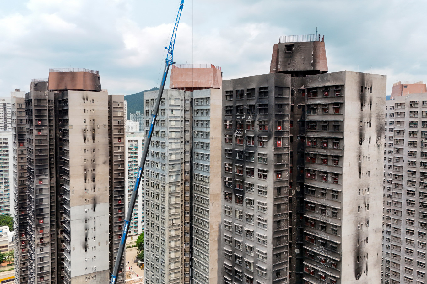 Hong Kong allows fire victims to visit ravaged homes