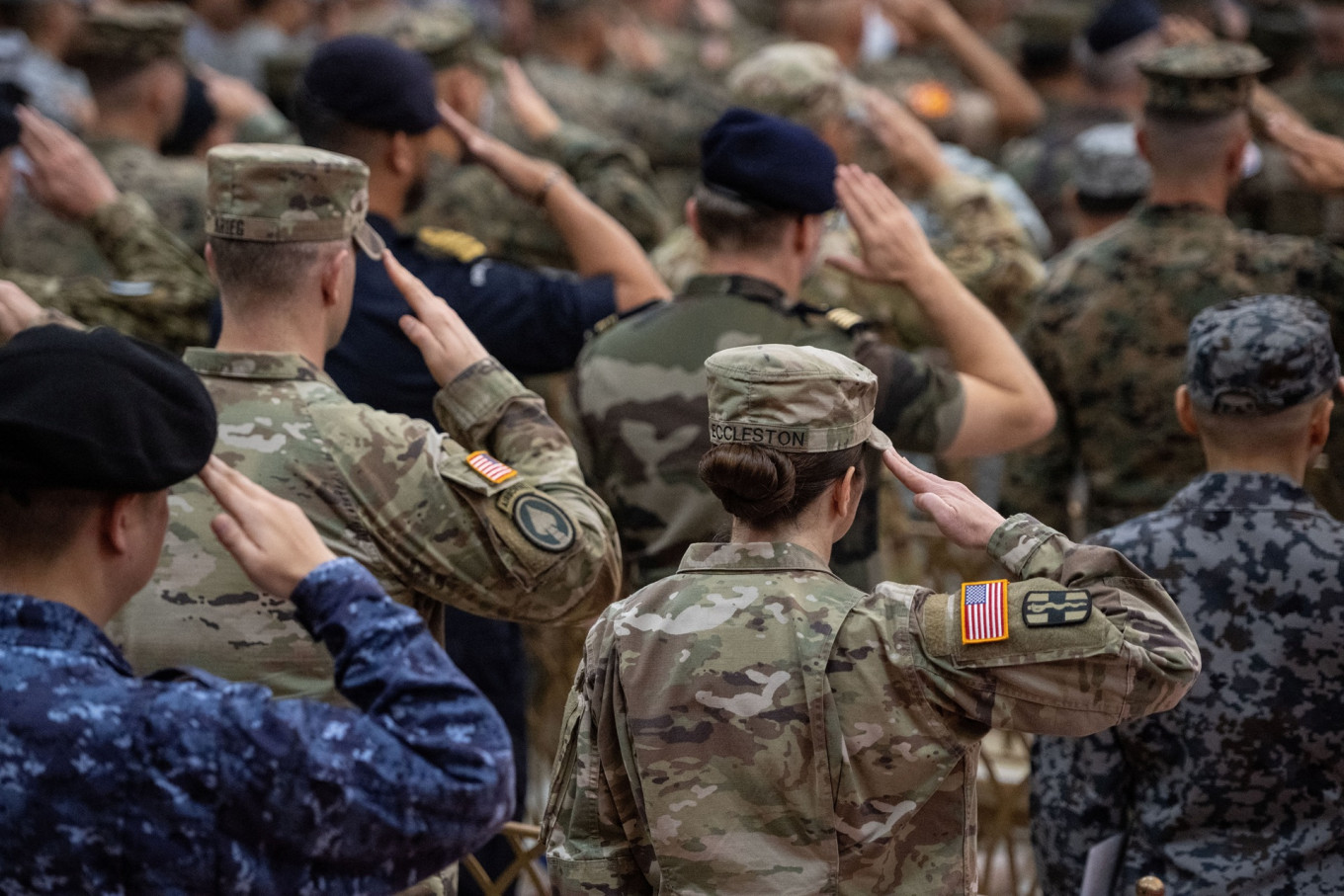Philippine and United States soldiers salute during the flag ceremony at the opening ceremony of the US-Philippines &ldquo;Balikatan&ldquo; joint military exercises at Camp Aguinaldo in Quezon City, Metro Manila, tje Philippines, on April 20, 2026.