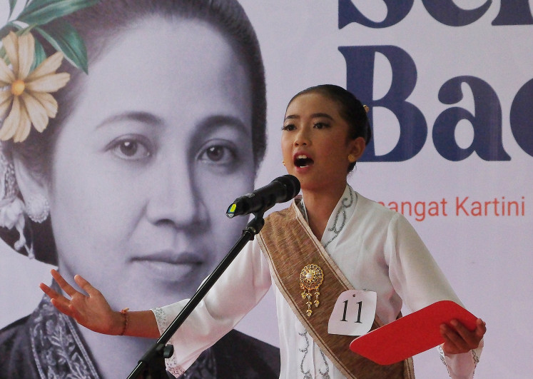 Emancipated voice: A student recites a poem on April 21, 2026, during a poetry reading competition involving 16 top elementary schools to mark Kartini Day in Badung, Bali.
