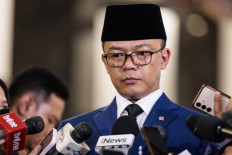 Foreign Minister Sugiono speaks to the media on April 4 following the arrival of the coffins of three Indonesian soldiers killed while serving with the United Nations Interim Force in Lebanon (UNIFIL) at Soekarno-Hatta International Airport in Tangerang. Indonesia received the bodies of three peacekeepers on April 4 who were killed while on deployment in Lebanon and called for security guarantees for blue helmets a day after another three of its soldiers were injured. 