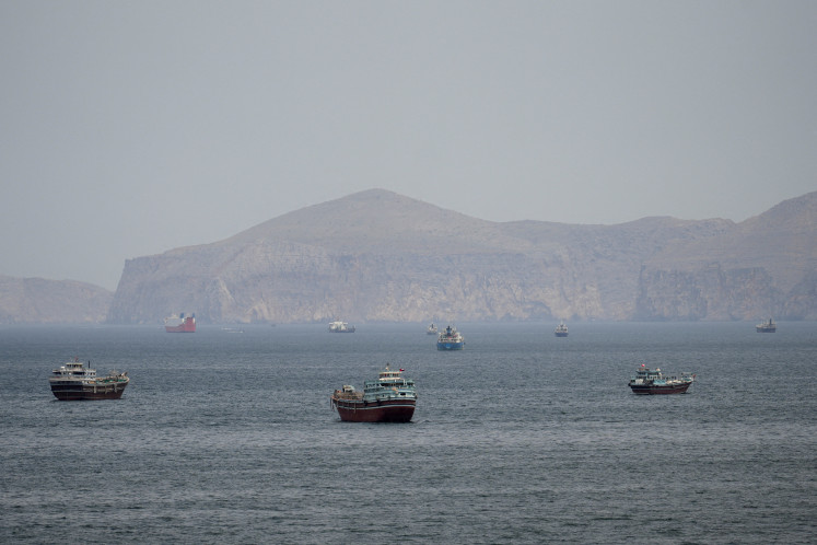 Ships and boats in the Strait of Hormuz, Musandam, Oman, April 22, 2026. 