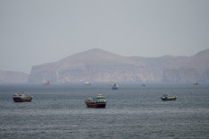 Ships and boats in the Strait of Hormuz, Musandam, Oman, April 22, 2026. 