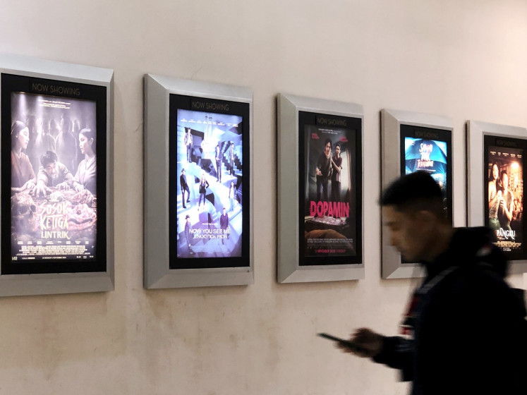 View of the 'Now Showing&rsquo; movie list as seen in front of Cinema XXI inside a shopping mall on Jl. Basuki Rachmat, East Jakarta, on Nov. 13, 2025. 