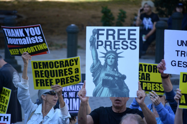 Protesters attend a rally in support of press freedom outside the Immigration and Customs Enforcement (ICE) headquarters in New York, United States, on Oct. 1, 2025 after assaults on journalists by ICE officers in the city.