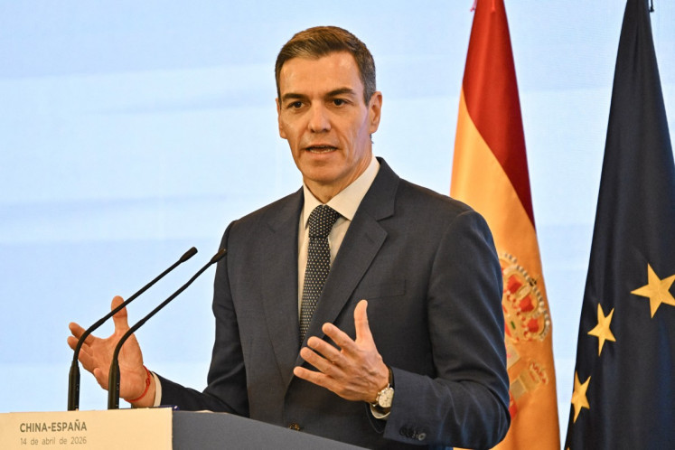 Spanish Prime Minister Pedro Sanchez speaks during a press conference in Beijing, China on April 14, 2026, after a meeting with Chinese President Xi Jinping. Sanchez urged reform to make the world order &ldquo;more representative&ldquo; after talks with Chinese President Xi Jinping in Beijing.