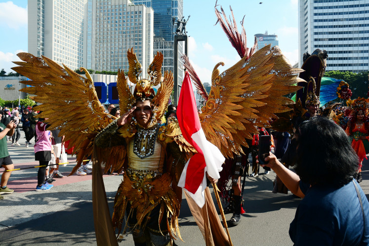 Cultural pride: Participants take part in the &ldquo;Parade Inspirasi Diri&rdquo; on April 26 during the Car Free Day (CFD) event at Jakarta&rsquo;s Hotel Indonesia traffic circle. The parade, showcasing a cross-disciplinary arts collaboration featuring 143 dancers, musicians and choir members, is part
of the Road to Pagelaran Sabang Merauke 2026, which will be held Aug. 21-23 at Indonesia Arena in Senayan, Jakarta.