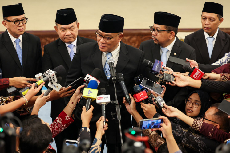 Newly appointed Environment Minister Mohammad Jumhur Hidayat speaks to media on April 27 after his inauguration at the Presidential Palace in Jakarta.. 