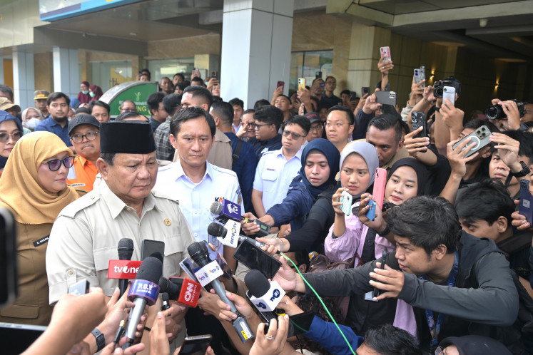 Indonesian President Prabowo Subianto speaks to reporters after visiting victims of a collision between a commuter train and a passenger train at dr. Chasbullah Abdulmadjid Regional Hospital in Bekasi, Tuesday, April 28, 2026.