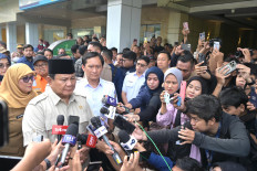 President Prabowo Subianto speaks to reporters on Tuesday, April 28, after visiting victims of a collision between a commuter train and a passenger train at Dr. Chasbullah Abdulmadjid Regional Hospital in Bekasi, West Java.