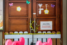 The Little Aresha daycare center is sealed by police after allegations of child abuse, in Umbulharjo, Yogyakarta, on April 27, 2026. Police have arrested 13 people after shocking images of alleged abuse against small children at a daycare centre went viral, sparking outrage across the nation.