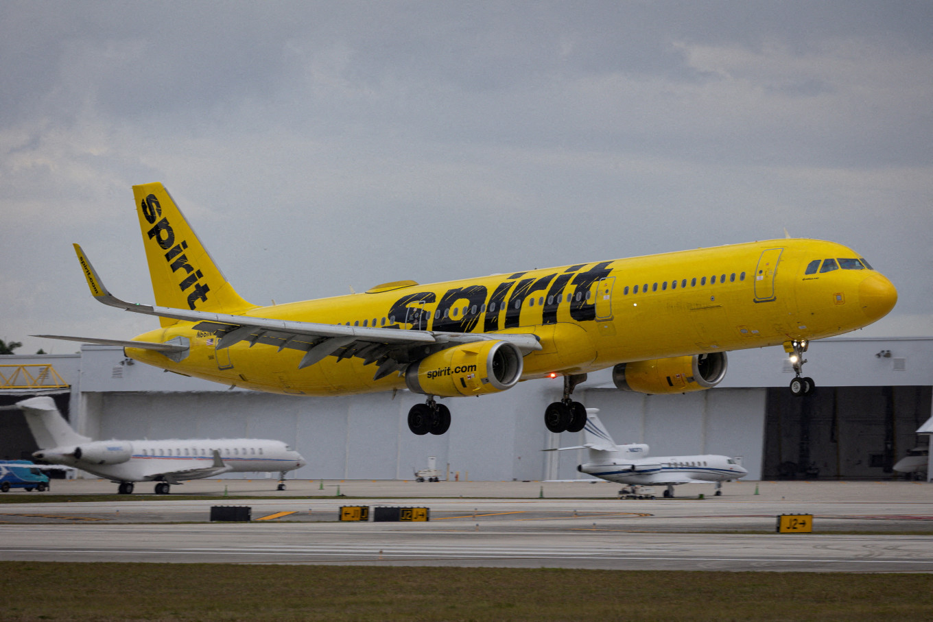 A Spirit Airlines flight arrives at Fort Lauderdale - Hollywood International Airport, in Fort Lauderdale, Florida, US, on April 23, 2026.