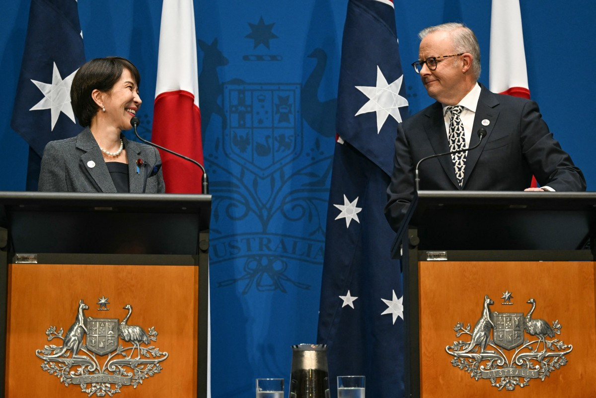 Australia's Prime Minister Anthony Albanese (right) and Japan's Prime Minister Sanae Takaichi speak to the press at Parliament House in Canberra on May 4, 2026.