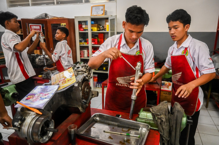 A number of students take part in automotive training at a private vocational school in Jakarta on April 4, 2026. The Jakarta administration expanded its free private school program in 2026 covering 103 schools across various education levels, aiming to expand access to education for Jakarta residents.
