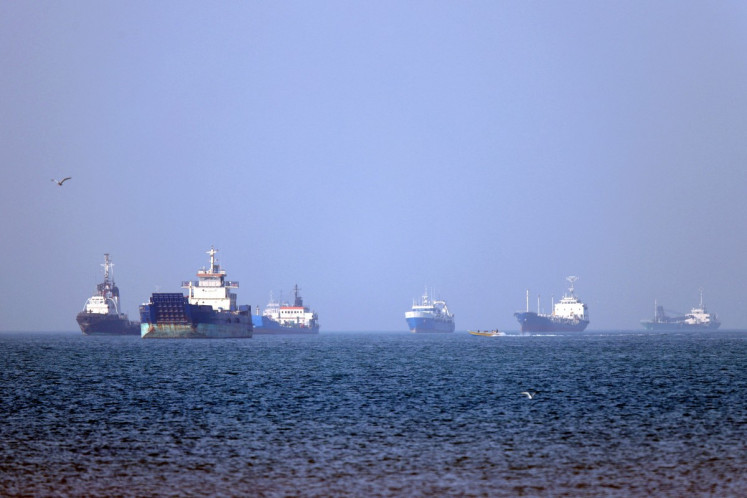 In this picture obtained from Iran's ISNA news agency on May 4, 2026, vessels are pictured anchored in the Strait of Hormuz off Bandar Abbas in southern Iran.