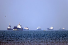 In this picture obtained from Iran's ISNA news agency on May 4, 2026, vessels are pictured anchored in the Strait of Hormuz off Bandar Abbas in southern Iran.