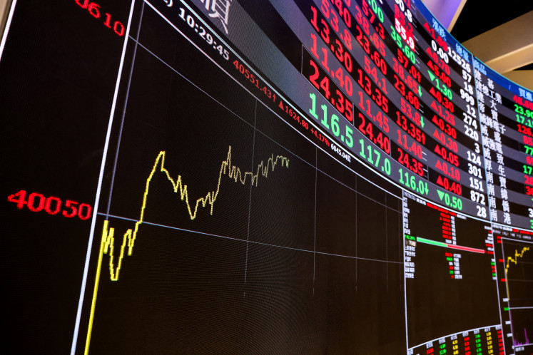A board displaying stock prices at the Taiwan Stock Exchange is seen in Taipei on May 4, 2026.