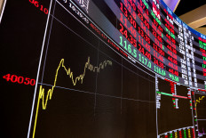 A board displaying stock prices at the Taiwan Stock Exchange is seen in Taipei on May 4, 2026.