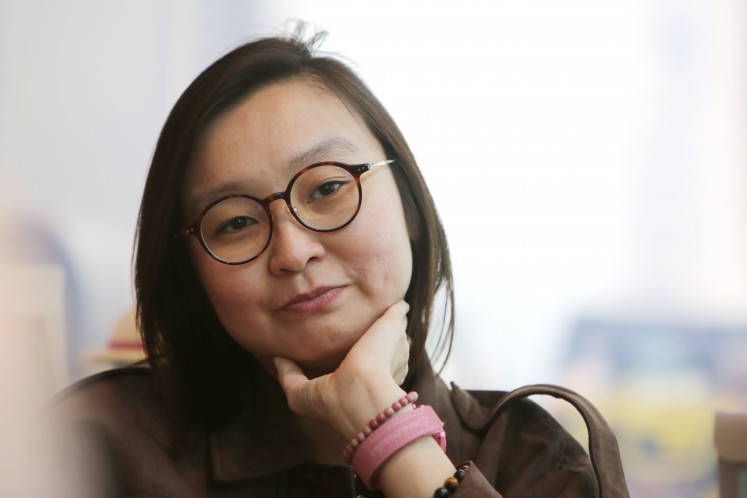 Deputy Creative Economy Minister Irene Umar gestures during an interview with The Jakarta Post at the ministry office in Autograph Tower, Thamrin Nine, Central Jakarta, on May 7, 2026.